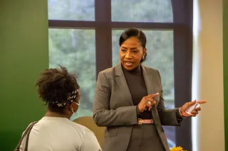 Chief C.J. Davis speaking with a student